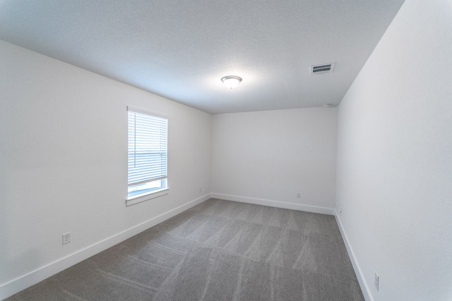 Spacious, unfurnished interior of a new home in Lariat, Liberty Hill (Image 22).