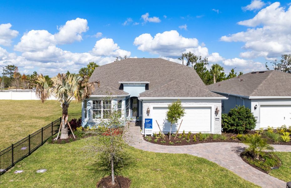 Representative exterior photo of a completed home built from the Mystique Grand by Del Webb in Del Webb Sunbridge, St. Cloud, FL (Image 2). Representative exterior photo of a completed home built from the Mystique Grand by Del Webb in Del Webb Sunbridge, St. Cloud, FL (Image 2).