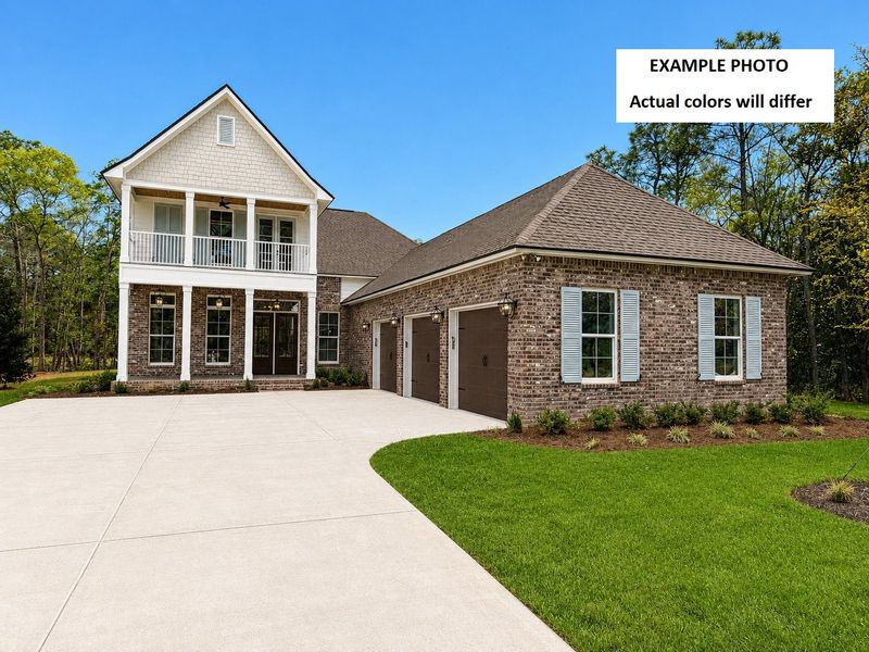 Front exterior of a new home in Steamboat Landing at Hammock Bay, Freeport, FL, highlighting curb appeal (Image 2). Front exterior of a new home in Steamboat Landing at Hammock Bay, Freeport, FL, highlighting curb appeal (Image 2).