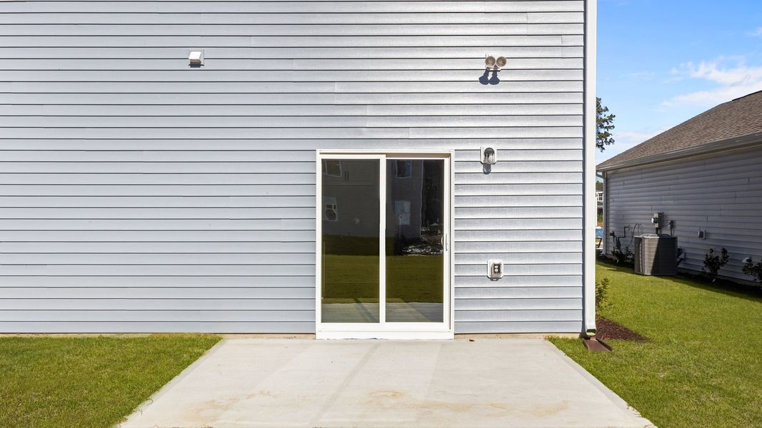 Exterior details and patio area of a home in West New Bern, New Bern (Image 25).
