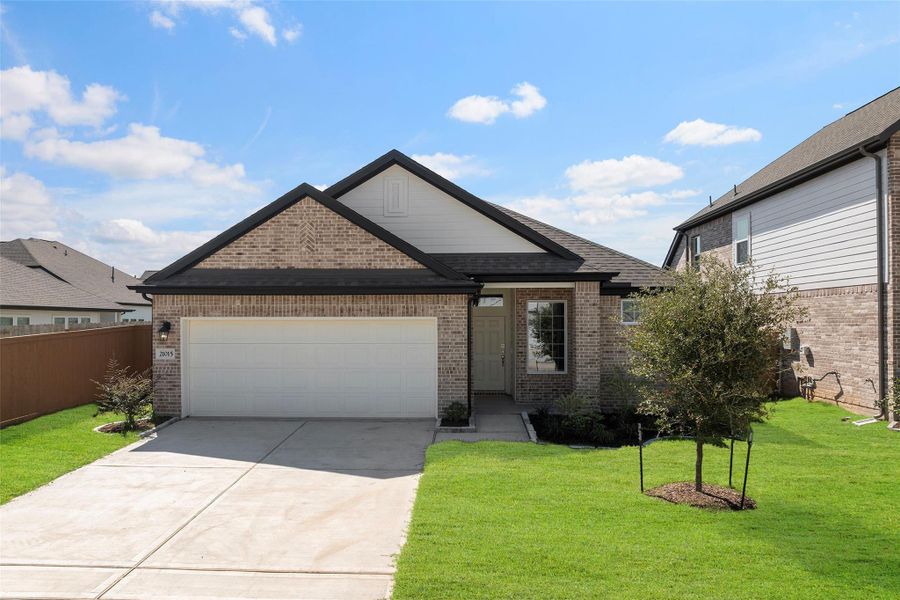 Front exterior of a new home in , Cypress, TX, highlighting curb appeal (Image 2). Front exterior of a new home in , Cypress, TX, highlighting curb appeal (Image 2).