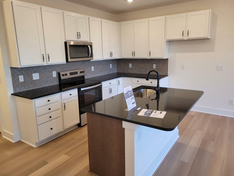 Furnished interior view inside a new home in 1158 Place Townhomes, Wilson (Image 6).