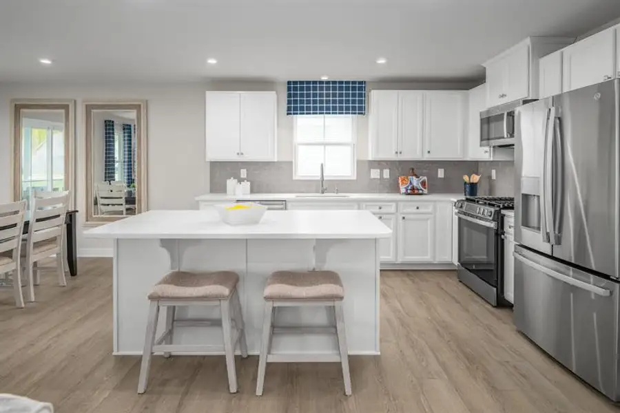 Furnished interior view inside a new home in Reidville Town Center Cottages, Duncan (Image 3).