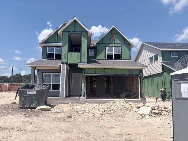 New construction home under development showcases two levels of sharp gabled architecture. New construction home under development showcases two levels of sharp gabled architecture.