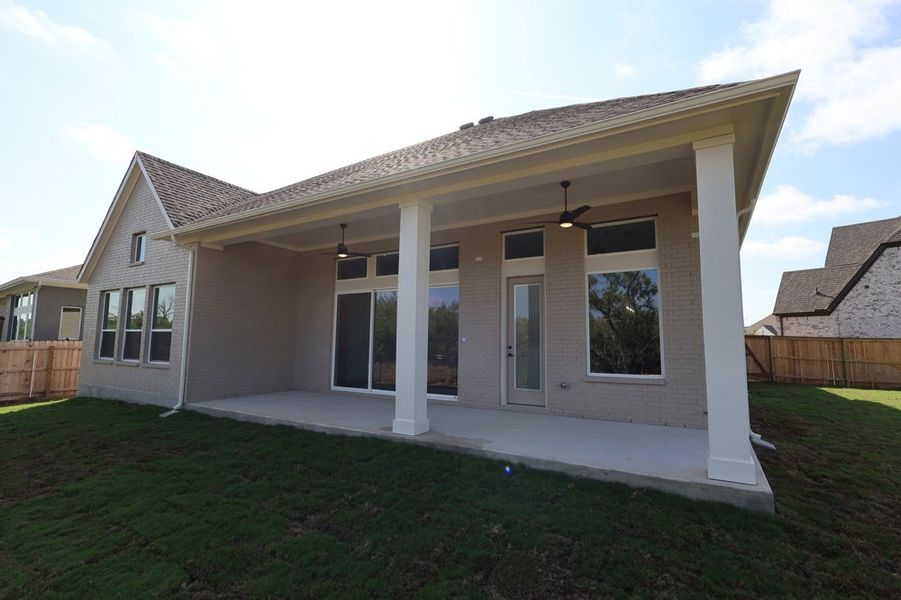 Exterior details and patio area of a home in Briggs Ranch – Signature Legacy Series, San Antonio (Image 4). Exterior details and patio area of a home in Briggs Ranch – Signature Legacy Series, San Antonio (Image 4).