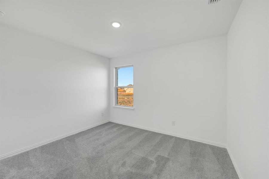 Spacious, unfurnished interior of a new home in Lily Creek at Sutton Fields, Aubrey (Image 32).