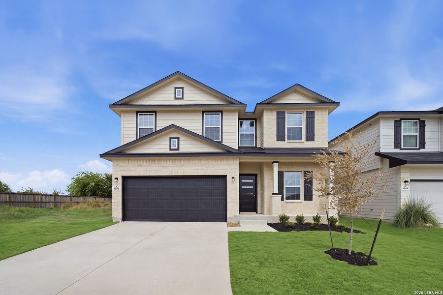 Front exterior of a new home in Morgan Meadows, San Antonio, TX, highlighting curb appeal (Image 19).
