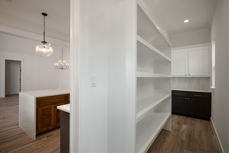 Furnished interior view inside a new home in Greens Prairie Reserve, College Station (Image 11).