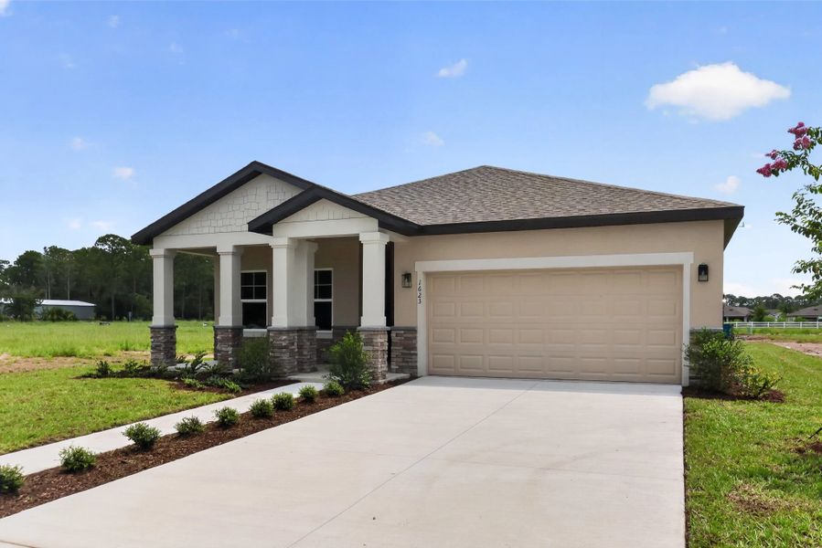 Front exterior of a new home in Tyson Reserve, St. Cloud, FL, highlighting curb appeal (Image 2). Front exterior of a new home in Tyson Reserve, St. Cloud, FL, highlighting curb appeal (Image 2).