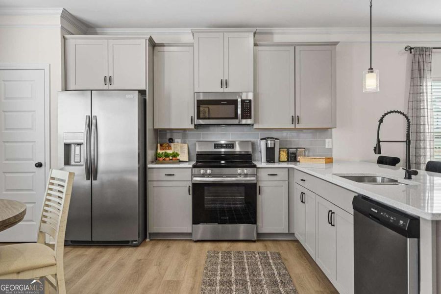 Furnished interior view inside a new home in Glendale Towns, Conyers (Image 10).