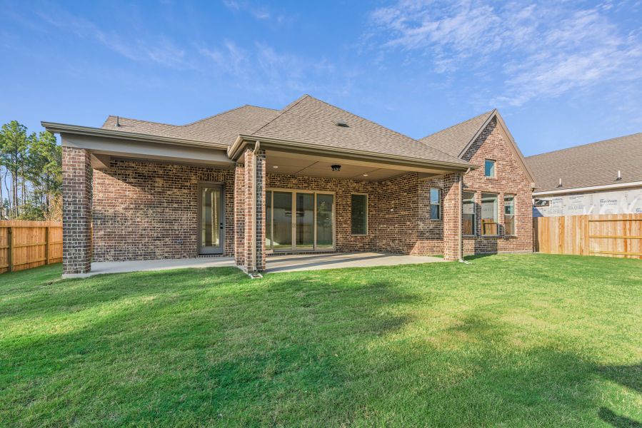 Exterior details and patio area of a home in ARTAVIA 65' Homesites, Conroe (Image 3).