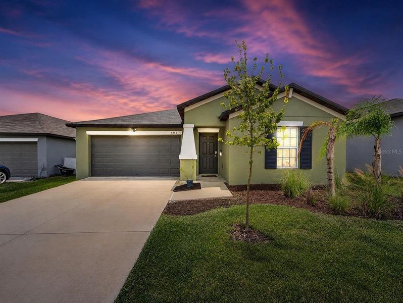 Front exterior of a new home in , Bartow, FL, highlighting curb appeal (Image 2).