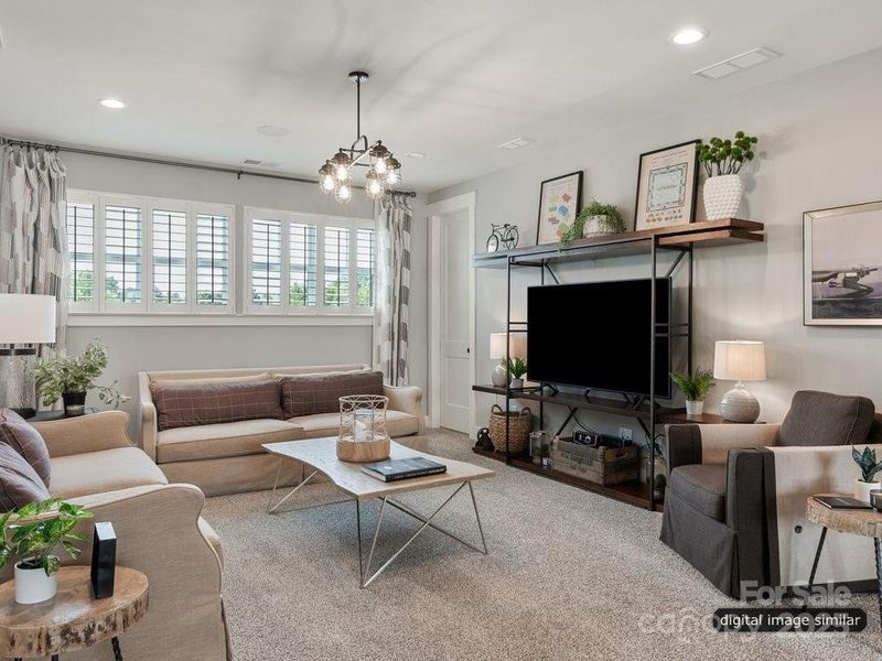 Furnished interior in a model home at McLean - South Shore in Clover (Image 26).