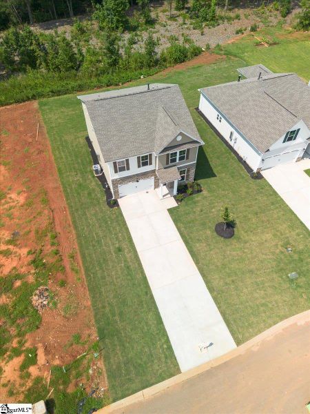 Front exterior of a new home in Lynbrook, Boiling Springs, SC, highlighting curb appeal (Image 2). Front exterior of a new home in Lynbrook, Boiling Springs, SC, highlighting curb appeal (Image 2).