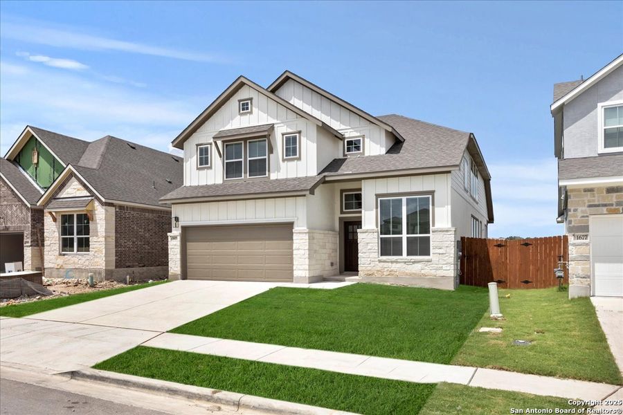 Front exterior of a new home in Meyer Ranch, Canyon Lake, TX, highlighting curb appeal (Image 2).