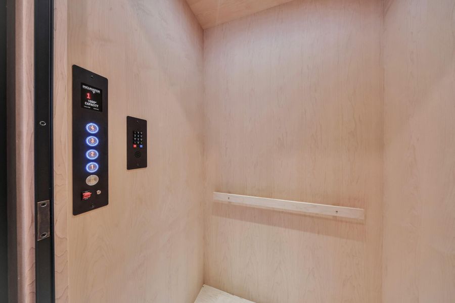 Modern home elevator with light wood paneling, a sleek control panel, and a capacity of 1000 pounds. Perfect for convenient multi-level access or for getting your groceries up! Modern home elevator with light wood paneling, a sleek control panel, and a capacity of 1000 pounds. Perfect for convenient multi-level access or for getting your groceries up!