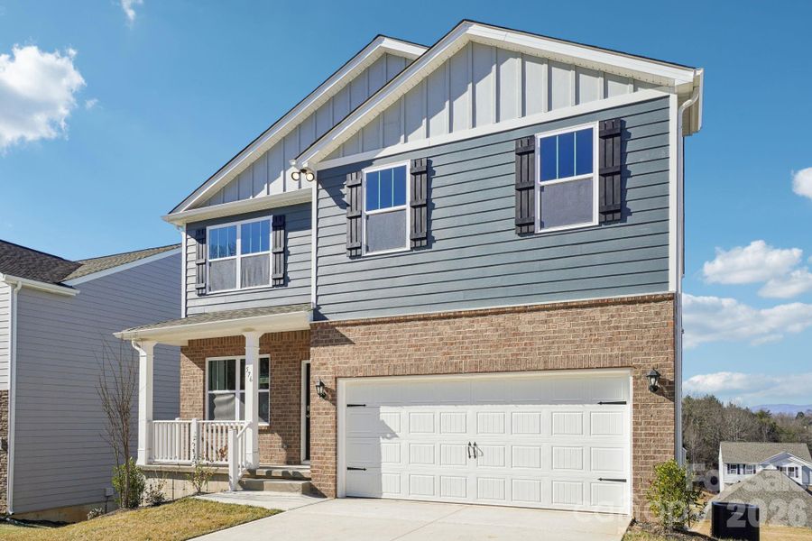 Front exterior of a new home in Rydele Heights, Asheville, NC, highlighting curb appeal (Image 16). Front exterior of a new home in Rydele Heights, Asheville, NC, highlighting curb appeal (Image 16).
