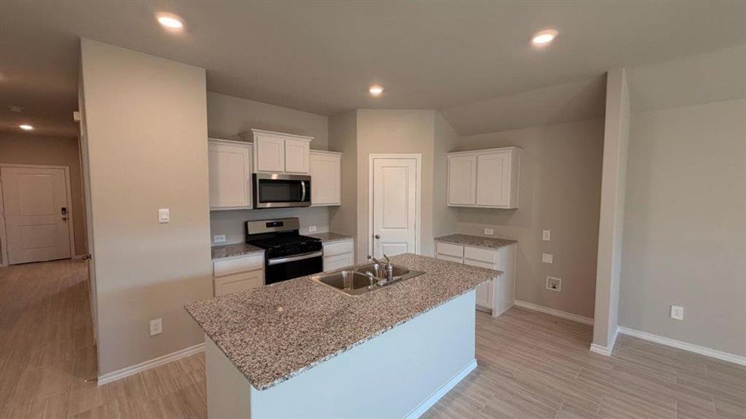 Kitchen- All Home and community information, including pricing, included features, terms, availability and amenities, are subject to change at any time without notice or obligation. All Drawings, pictures, photographs, video, square footages, floor plans, elevations, features, colors and sizes are approximate for illustration purposes only and will vary from the homes as built.