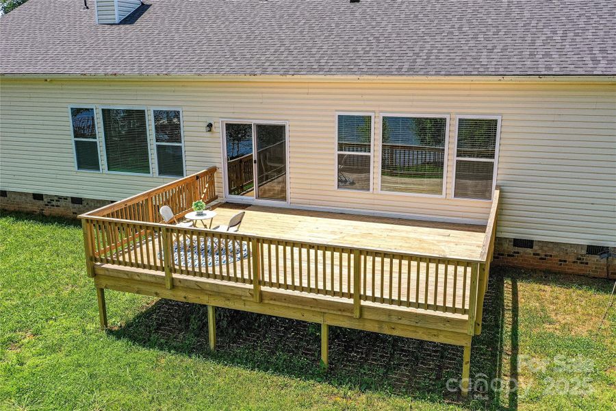 Aerial View of Spacious Deck perfect for relaxing peacefully or entertaining while taking in the gorgeous water views !