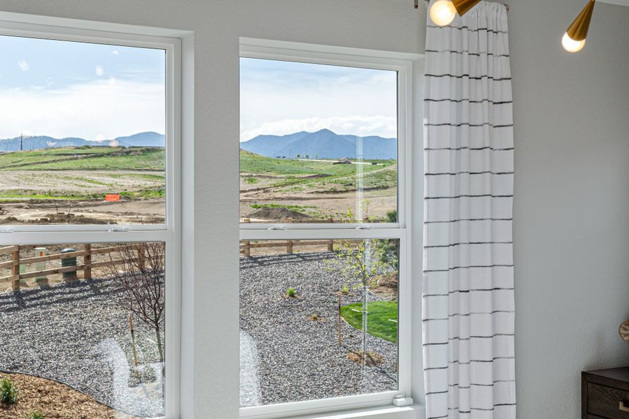 Exterior details and patio area of a home in Trailstone Town Collection, Arvada (Image 2).