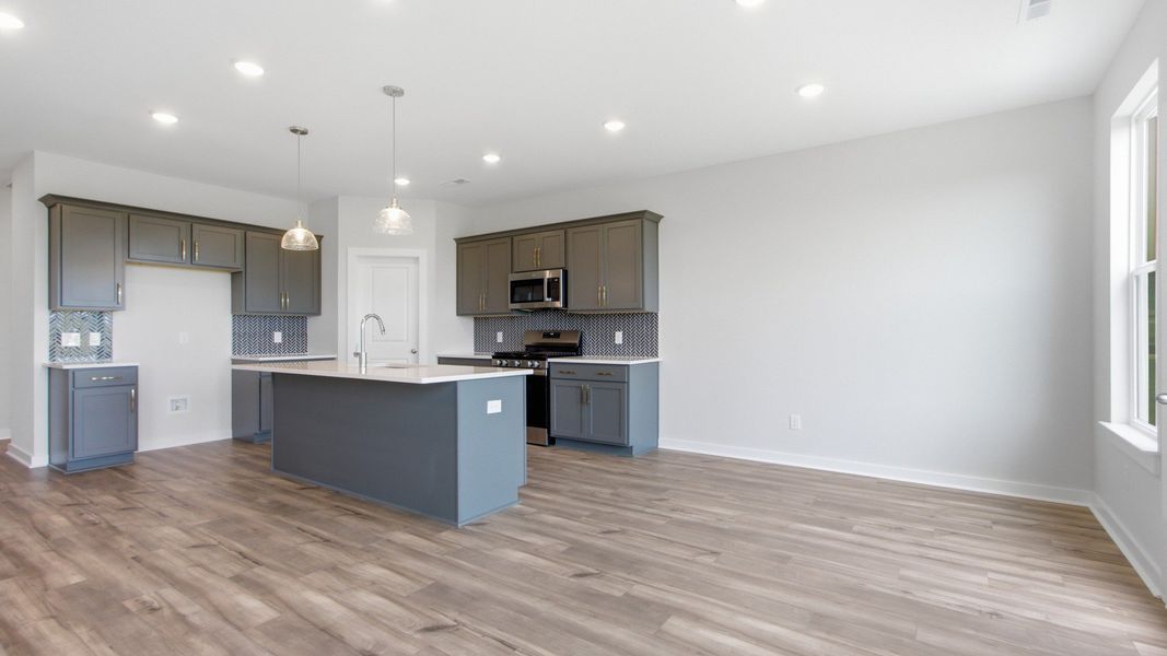Room for entertaining and hosting space alongside kitchen