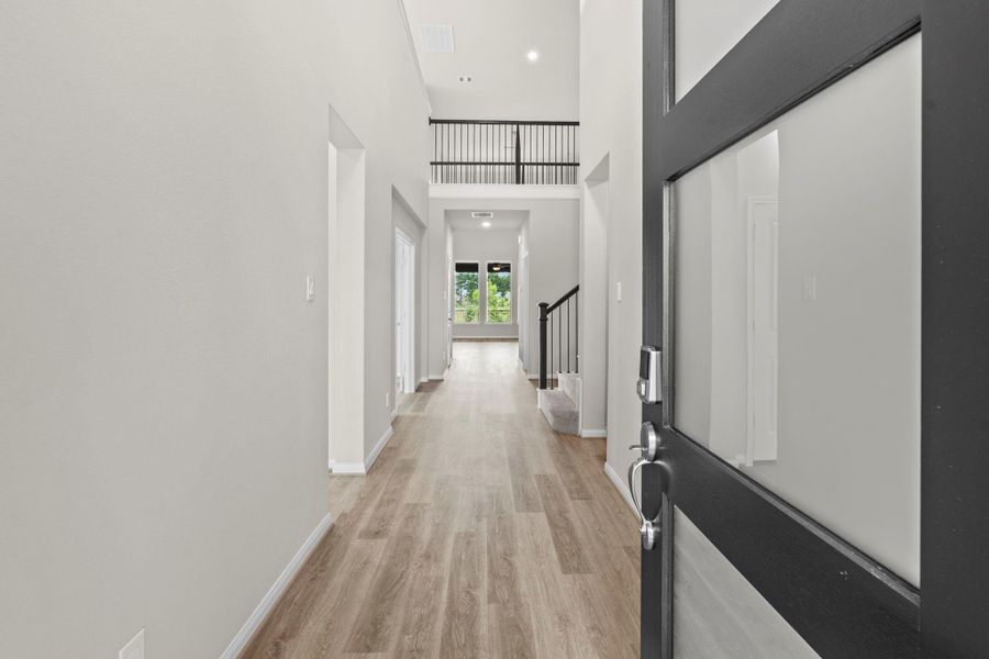 Spacious, unfurnished interior of a new home in Bridgeland, Cypress (Image 21).