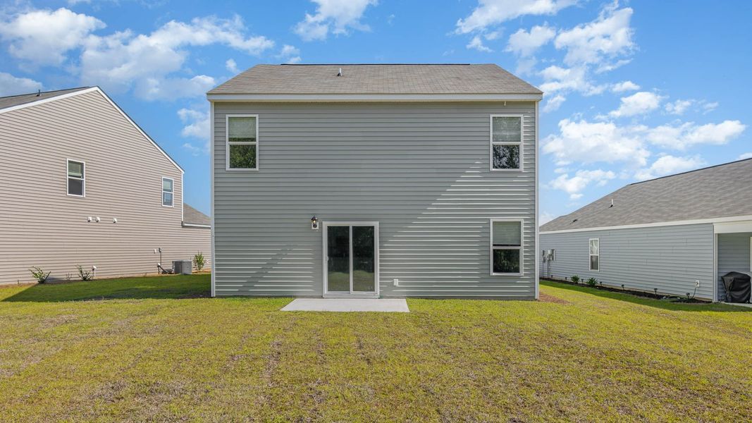 Representative exterior photo of a completed home built from the WREN by D.R. Horton in Cedar Hill Landing, Navassa, NC (Image 18).