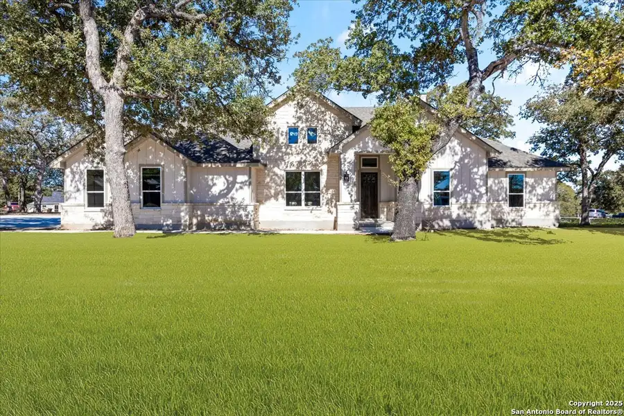 Front exterior of a new home in , La Vernia, TX, highlighting curb appeal (Image 2).