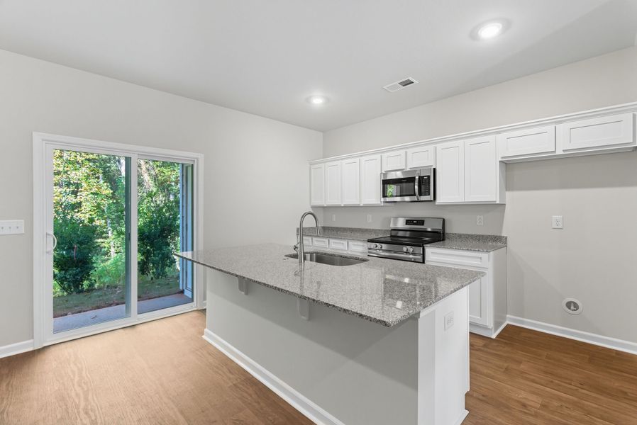 Representative furnished interior of a home built from the Palmetto II by McGuinn Homes in Clarke Townes, Anderson (Image 7).