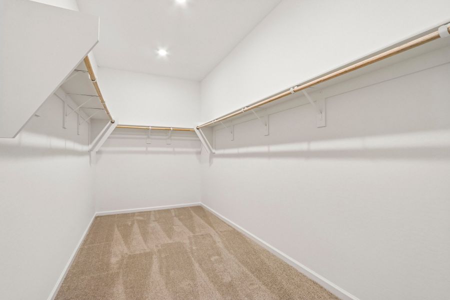 A hallway with white walls.