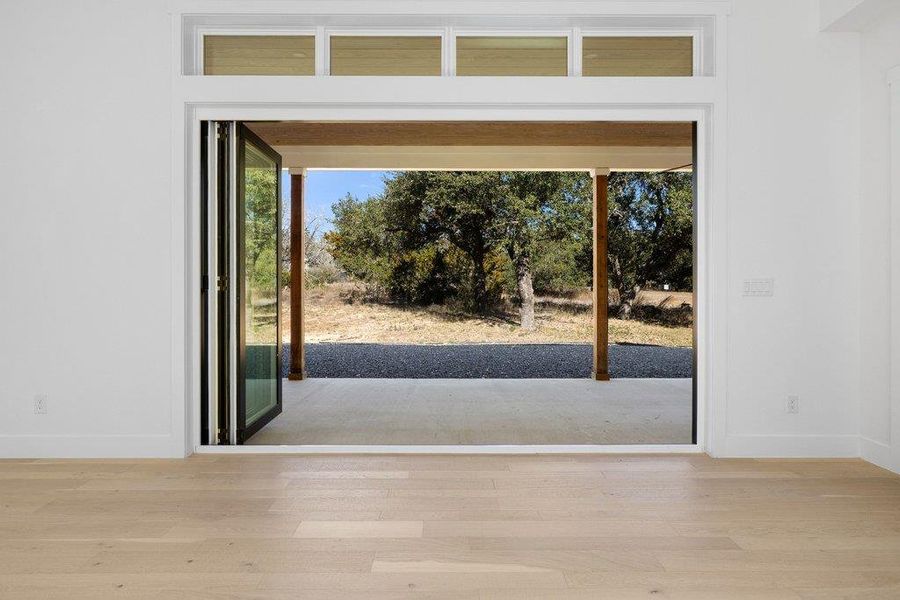 Doorway featuring wood finished floors