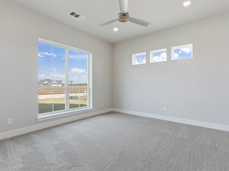 Unfurnished room with light colored carpet, recessed lighting, and ceiling fan
