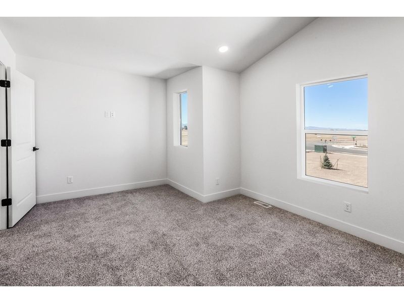 Spacious, unfurnished interior of a new home in Prairie Song Story Collection - Single Family Homes, Windsor (Image 32).