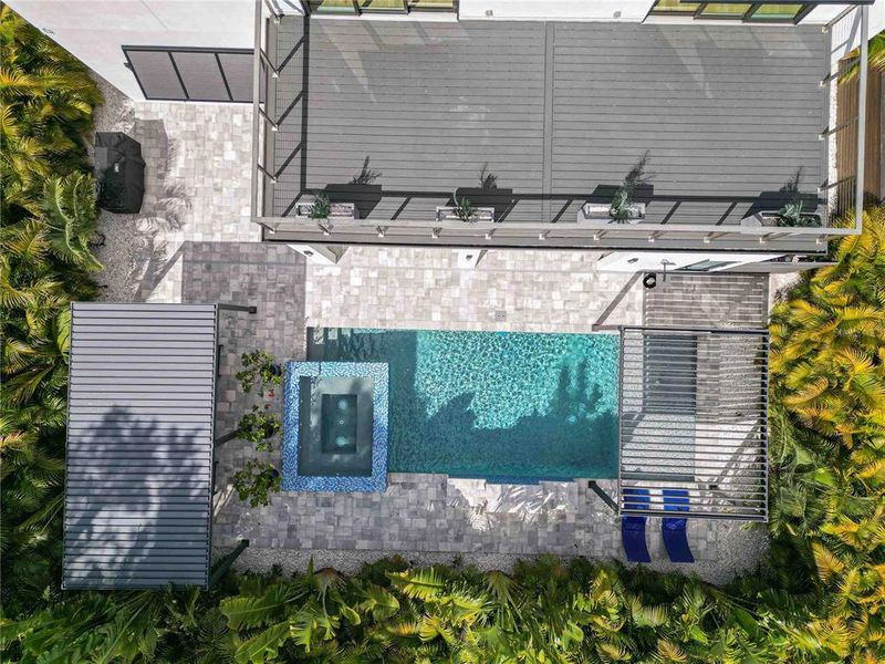 Exterior details and patio area of a home in , Sarasota (Image 26).