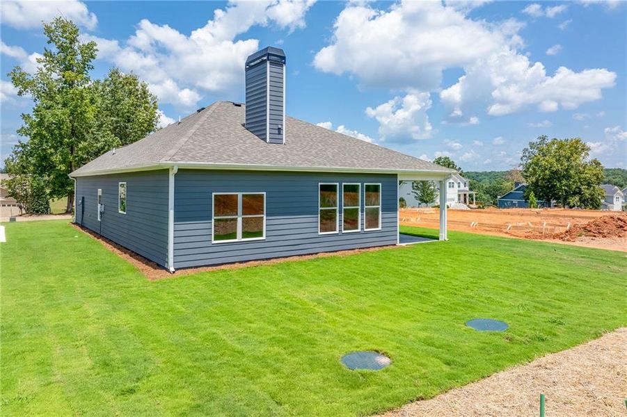 Front exterior of a new home in , Homer, GA, highlighting curb appeal (Image 7).