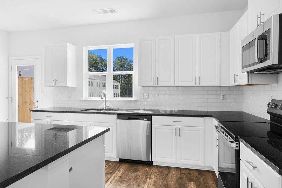 Furnished interior view inside a new home in Somerset at Veterans Memorial, Mableton (Image 11).