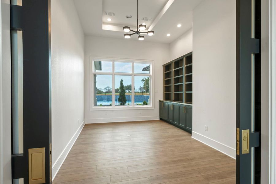 Large Study with French doors and built ins for that studious person of the house