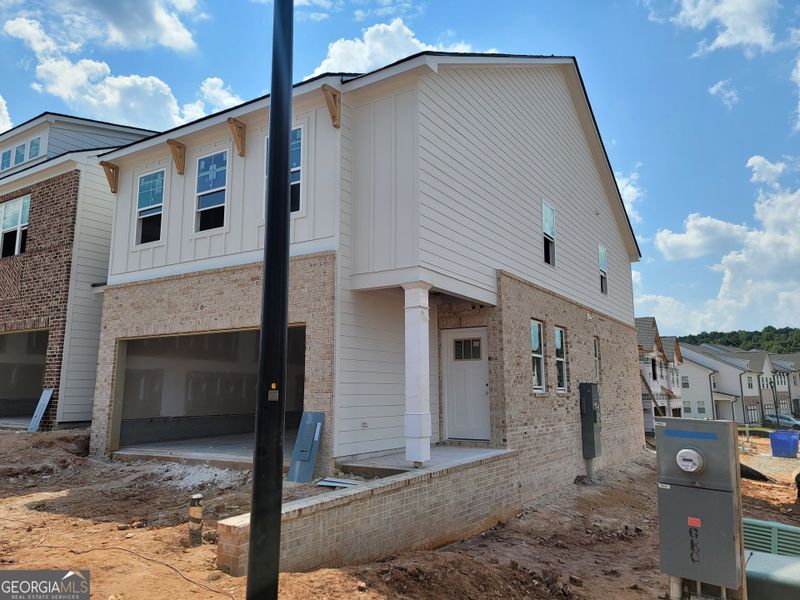In-progress construction of a new home in The Towns at Auburn Station West, Auburn, GA (Image 28).