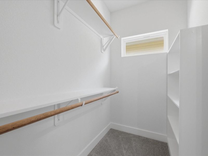 Generous walk-in closet space helps keep daily routines organized and clutter-free. Generous walk-in closet space helps keep daily routines organized and clutter-free.