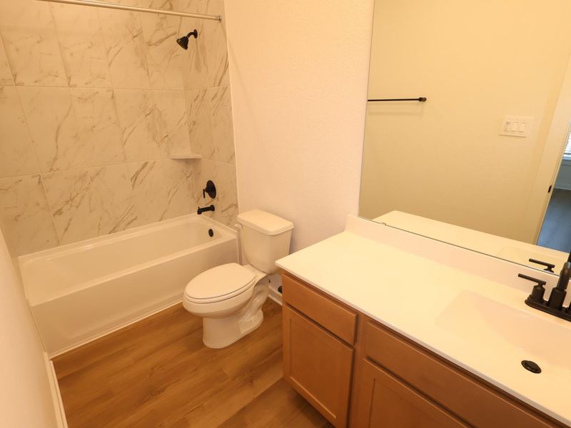 Furnished interior view inside a new home in Sorella, Tomball (Image 9).