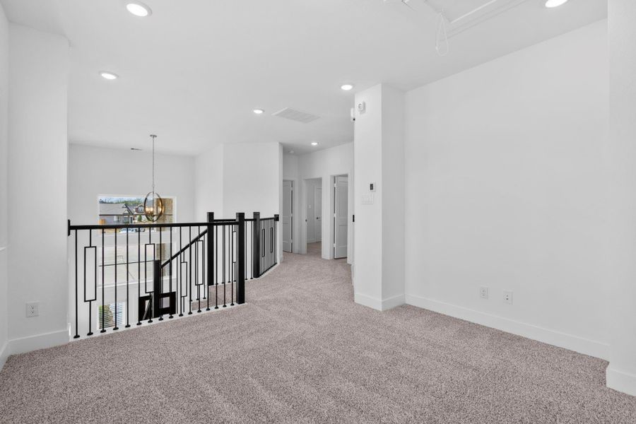 Spacious, unfurnished interior of a new home in Sienna, Missouri City (Image 8). Spacious, unfurnished interior of a new home in Sienna, Missouri City (Image 8).