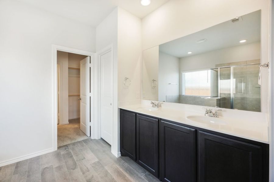 Representative exterior photo of a completed home built from the Lockhart by Impression Homes in Heartland, Heartland, TX (Image 20).