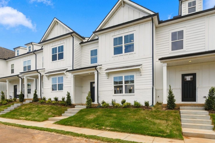 Front exterior of a new home in Wilson Meadows, Clarksville, TN, highlighting curb appeal (Image 17).