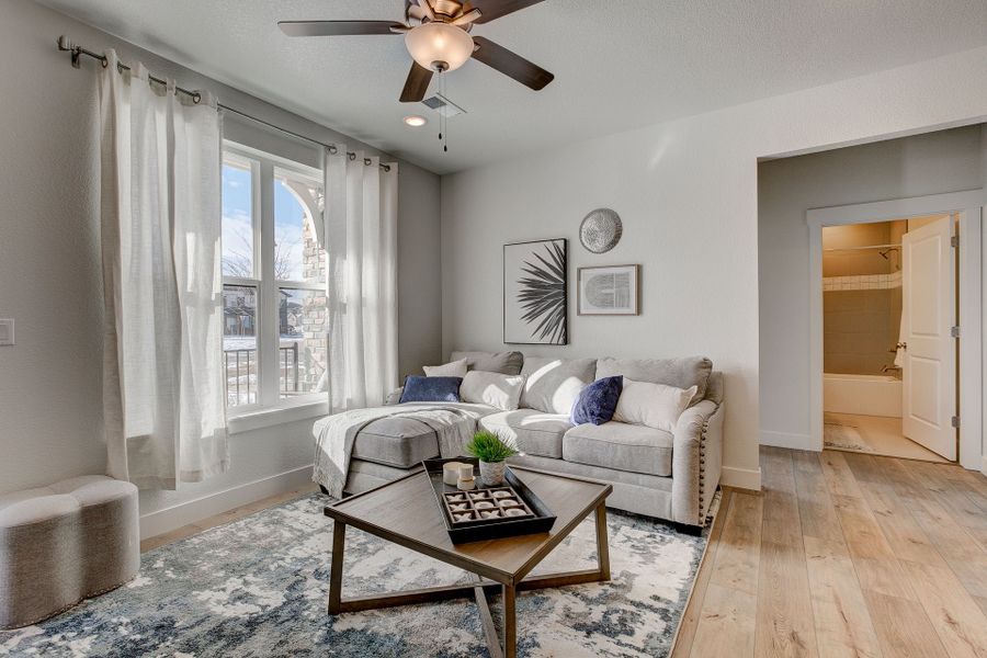 Representative furnished interior of a home built from the The Cambridge by Landmark Homes in The Lakes at Centerra, Loveland (Image 3).