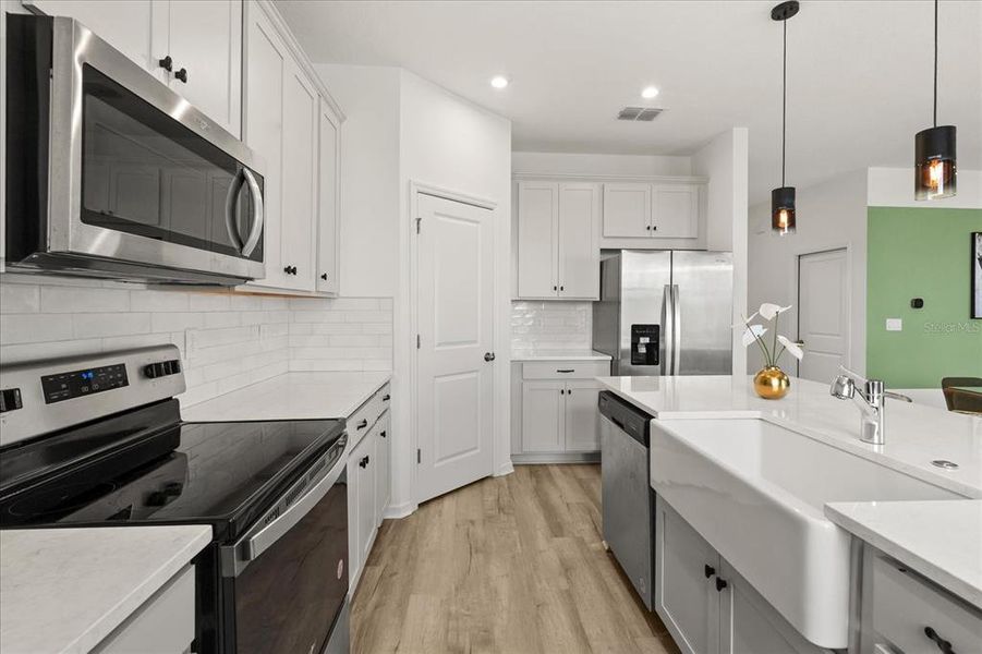 Furnished interior view inside a new home in , Kissimmee (Image 14). Furnished interior view inside a new home in , Kissimmee (Image 14).