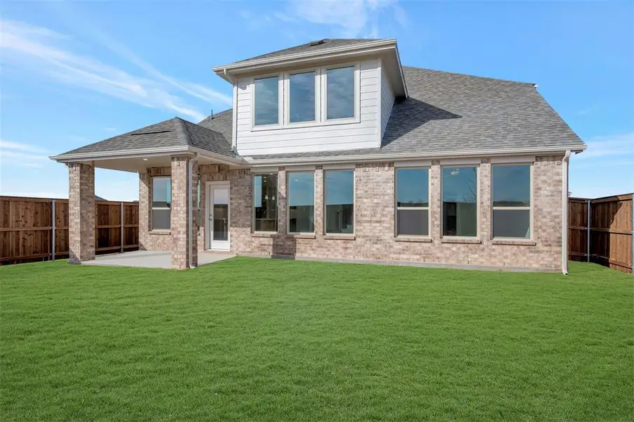 Exterior details and patio area of a home in Lily Creek at Sutton Fields, Aubrey (Image 3).