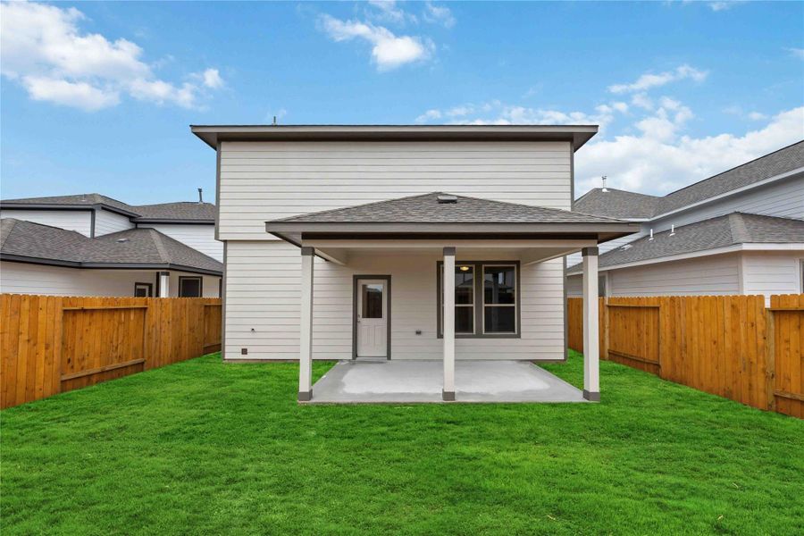Front exterior of a new home in Granger Pines, Conroe, TX, highlighting curb appeal (Image 17). Front exterior of a new home in Granger Pines, Conroe, TX, highlighting curb appeal (Image 17).