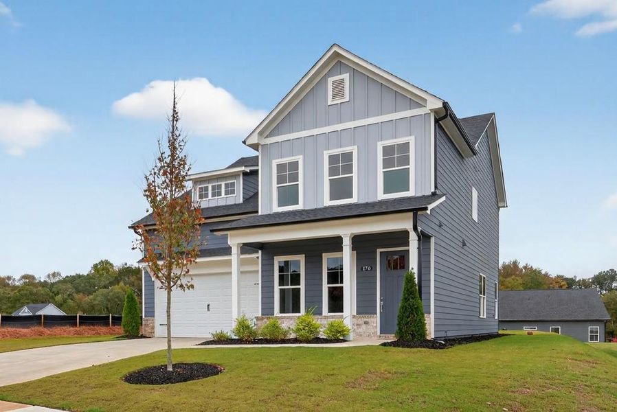 Front exterior of a new home in Red Bird Manor, Jefferson, GA, highlighting curb appeal (Image 2). Front exterior of a new home in Red Bird Manor, Jefferson, GA, highlighting curb appeal (Image 2).