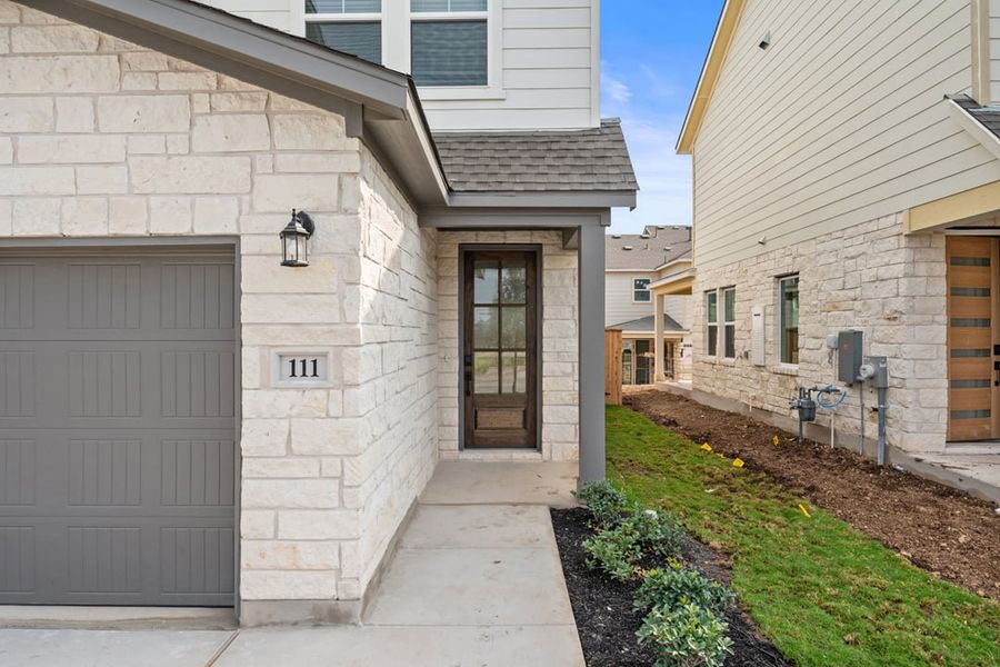 Exterior details and patio area of a home in Union Collection at Park Central, Georgetown (Image 3).