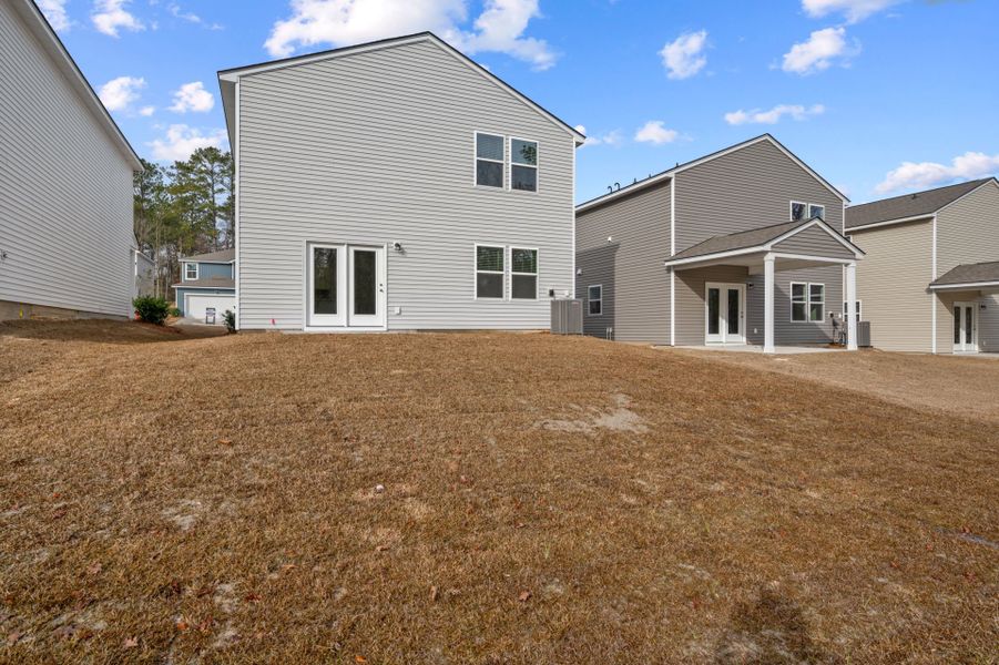 Exterior details and patio area of a home in Grand Arbor, Blythewood (Image 3).